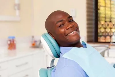 patient smiling while visiting Park View Dental in Eldridge, IA